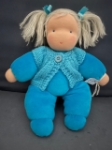 Afbeeldingen van Antroposofische pop, stevig, blauw Nicky met wollen vestje,  velours met schapenvol vulling